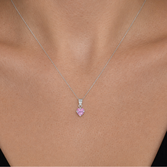 Punto de luz de plata con corazon rosado