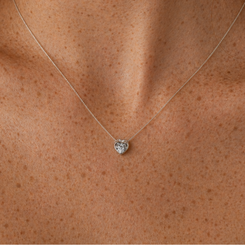 Punto de luz de plata modelo corazon